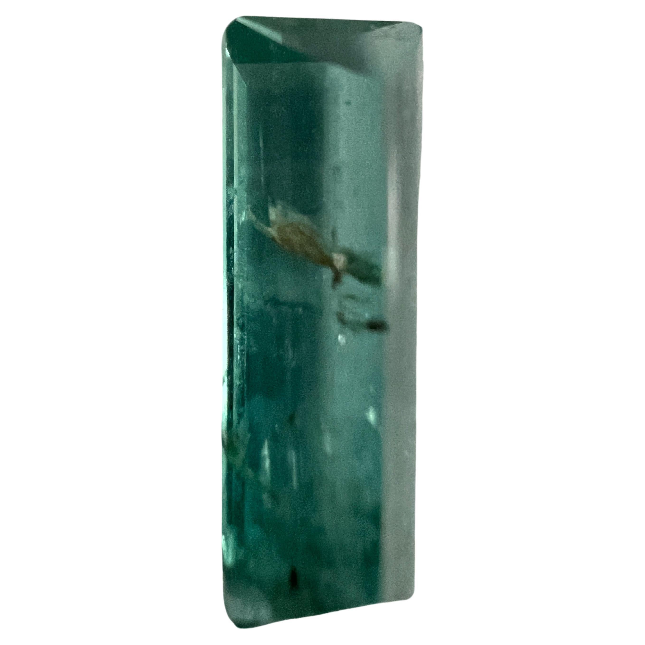 Discover the pure elegance of our 3.65ct Non-oiled Rectangle Cut Natural Emerald Gemstone. This exceptional gemstone radiates a deep, lush green, reminiscent of the richest foliage. Expertly fashioned in a sophisticated rectangle cut, it showcases a
