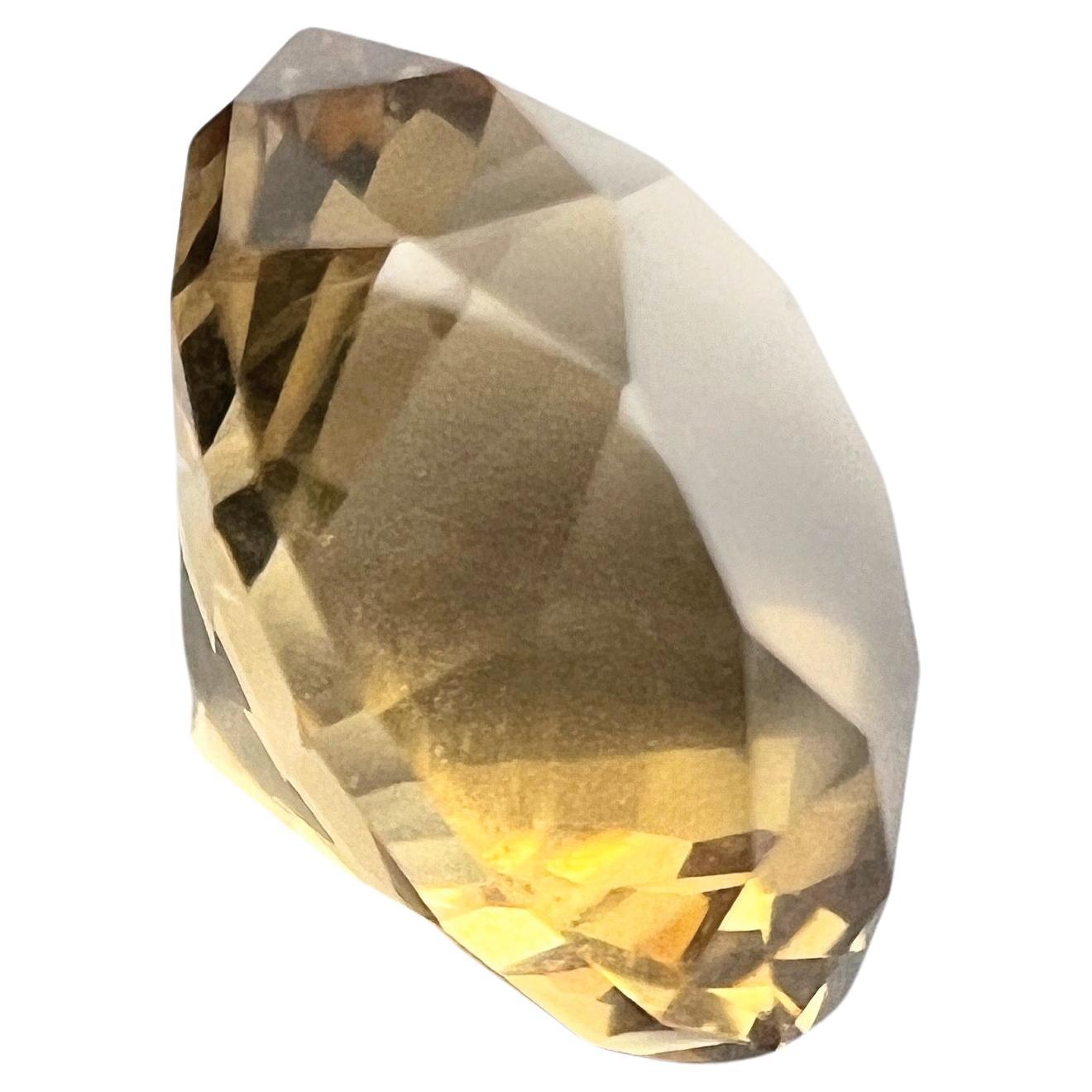 Embrace the captivating allure of our 3.85ct Brilliant Cut Natural UNHEATED Citrine Gemstone. With its precise dimensions of 10.2mm in length and 8.2mm in width, this gemstone is a paragon of elegance and charm. The oval cut accentuates the