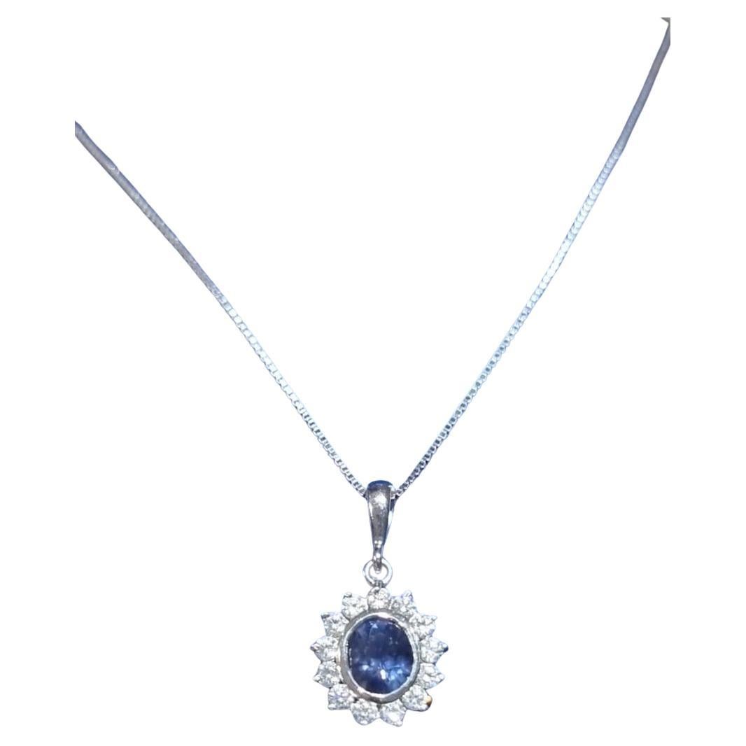 3.2ct Oval Natural Blue Sapphire Platinum Silver Bezel Necklace Pendant, a radiant masterpiece measuring 13.9x12.9 mm. This pendant is a true embodiment of sophistication and grace, perfect for adding a touch of luxury to any occasion.

At the heart