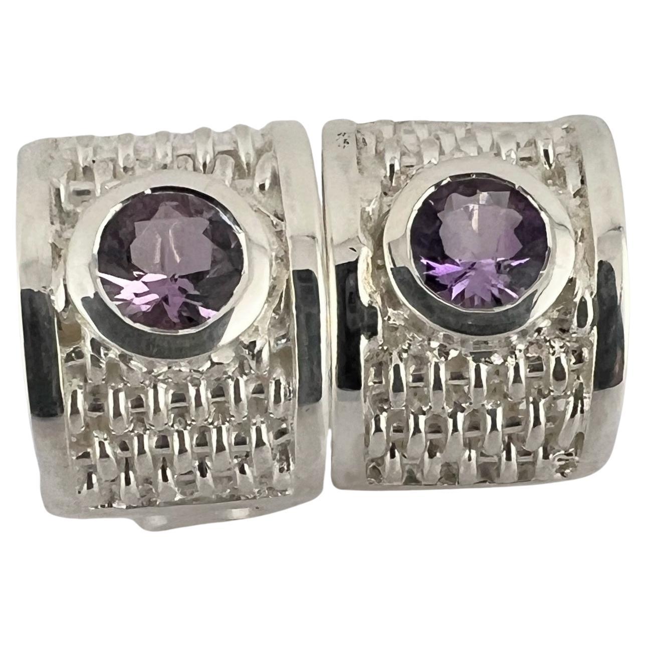 Handmade 3ctw Amethyst Lever-Back Earrings in Rhodium-Plated Sterling Silver with Basket Weave Design

Celebrate your individuality with these 3ctw amethyst lever-back earrings, meticulously handcrafted in rhodium-plated sterling silver. Each pair