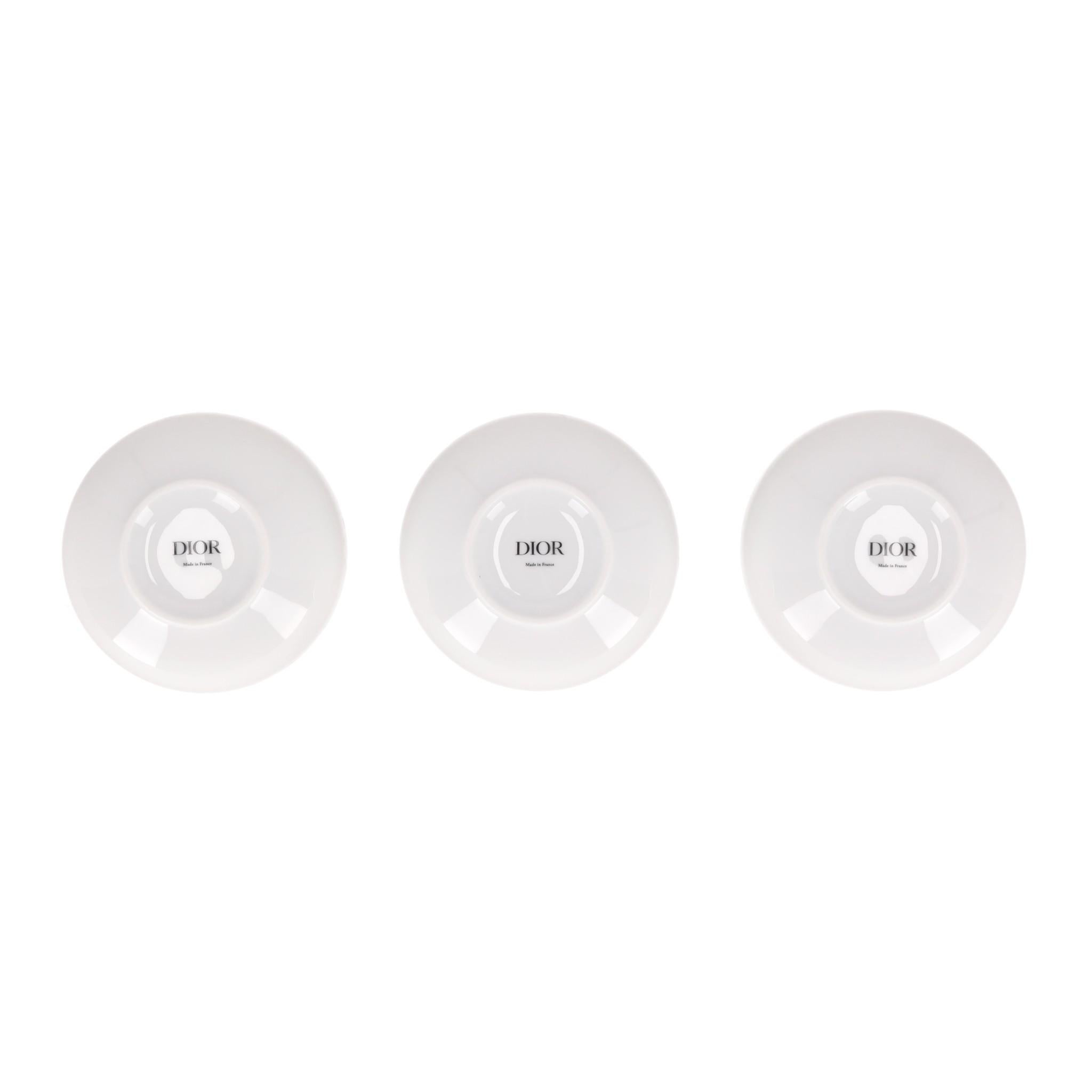 Collectors Item - Dior Set Of Three Cabinet de La Mer Limoges Porcelain Bowls

Inspired by the Cruise 2025 Fashion Show imagined by Maria Grazia Chiuri and Pietro Ruffo's multicolour Dior Cabinet de la Mer motif.

Set of three, white oval bowls