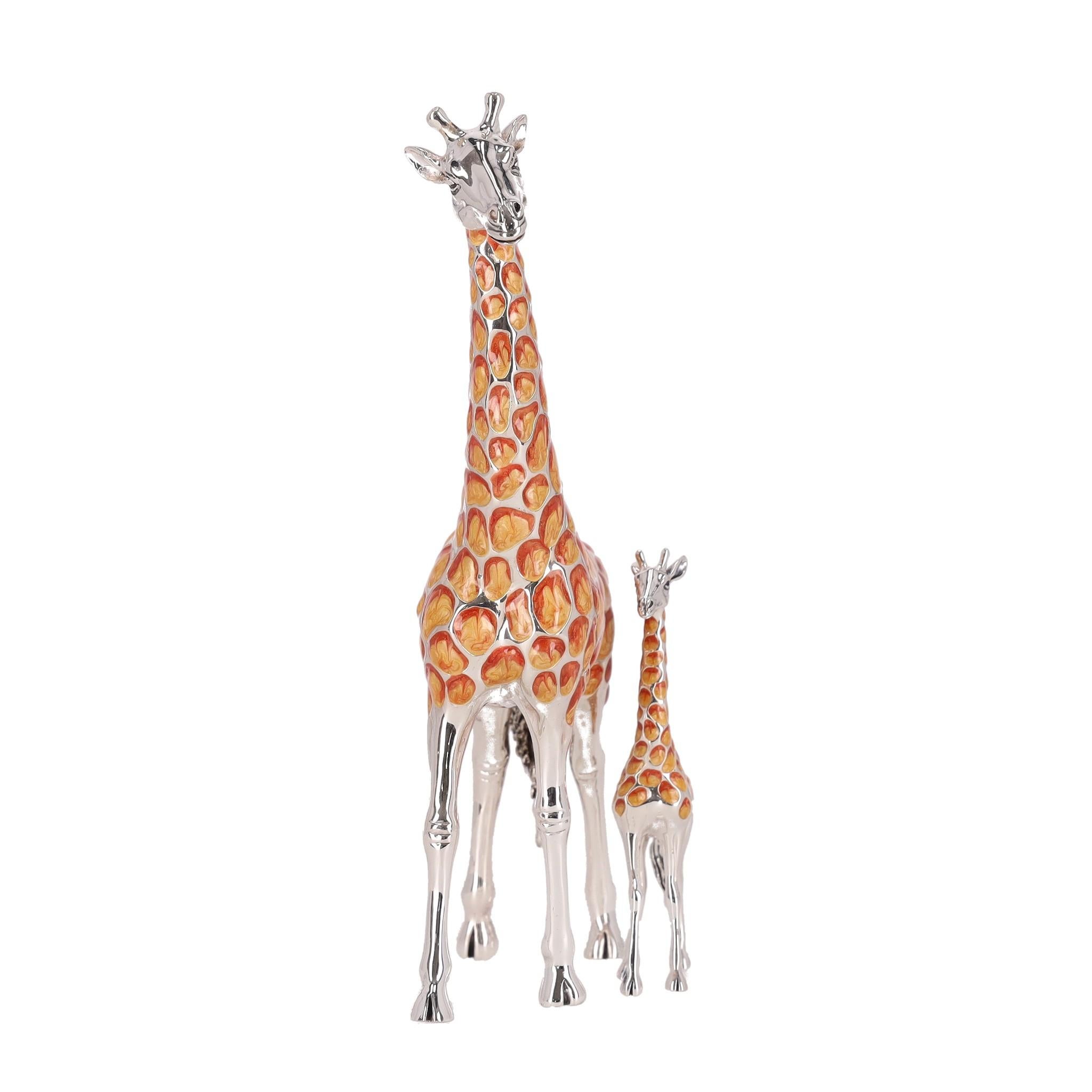Collectors Item - Saturno Set Of Two Hand Enamelled 925 Sterling Silver Giraffe Ornaments

Set of two giraffe ornaments crafted in Italy from 925 sterling silver and hand-painted with enamel.

Coated in lacquer to protect and prevent against