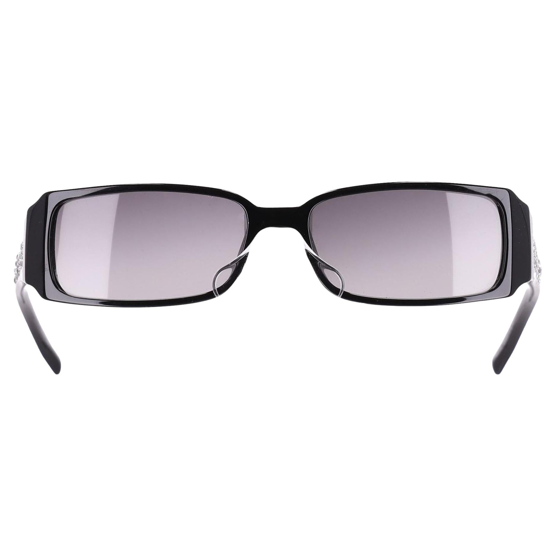 Lunettes de soleil Christian Dior avec logo en cristal sur les branches
