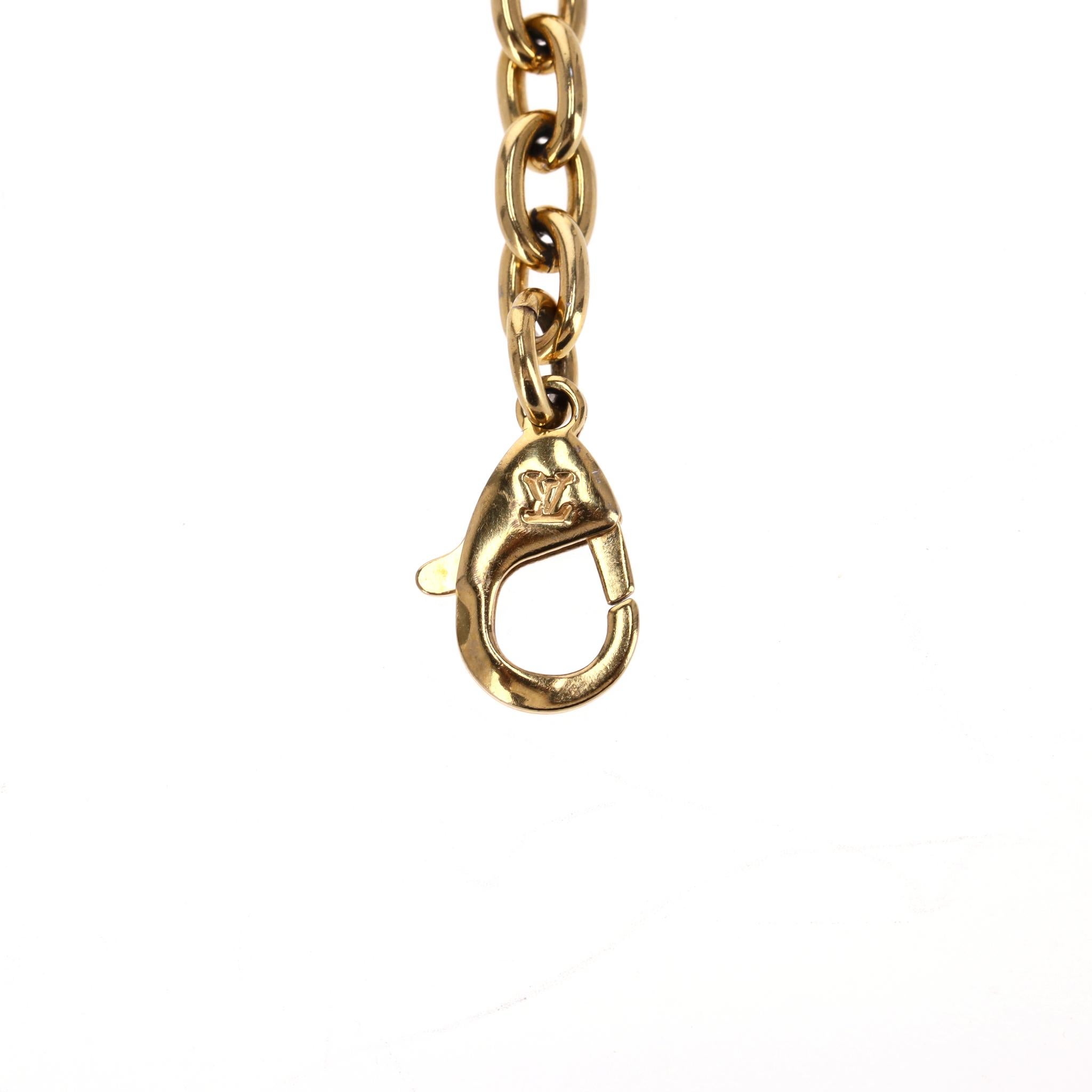 Femenino o masculino Funda de goma con monograma de camión Louis Vuitton para iPhone 14 Pro con cadena en venta