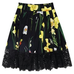 Dolce & Gabbana – Plisseerock mit Iris-Print und Spitzenbesatz