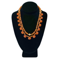 Collana a doppio filo di corniola ripiena d
oro 14K con brioletta a cuore