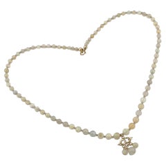 14K Yellow Gold Ethiopian Faceted Opal Pendant Necklace by Nouveau Boutique
