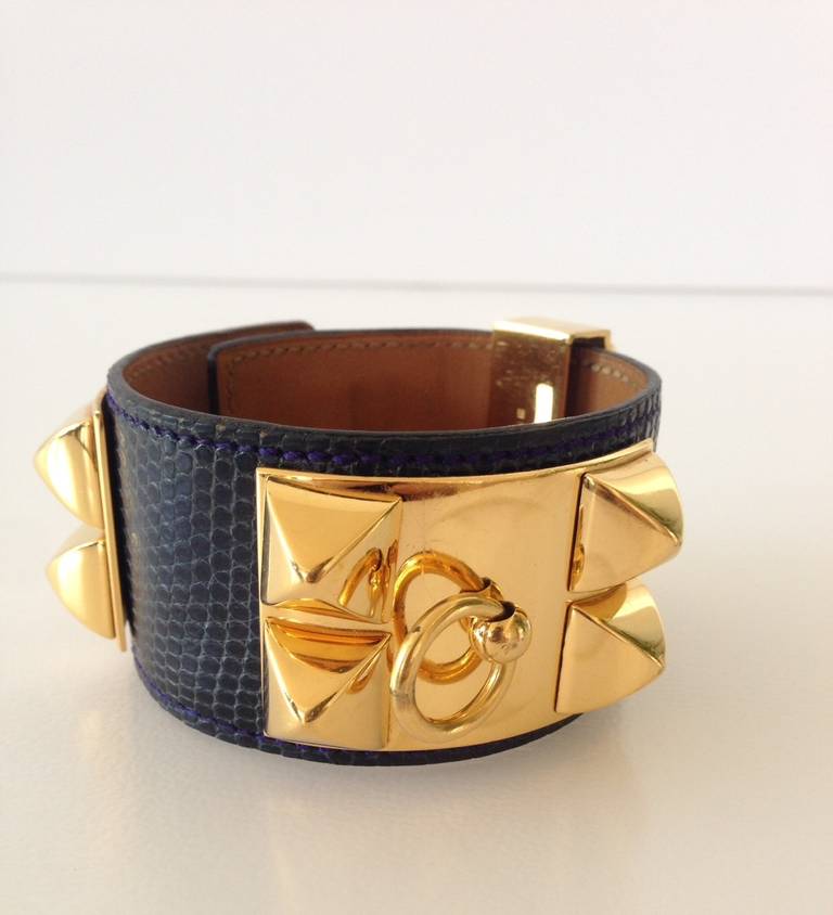 Hermes Collier de Chien CDC Lizard blue bracelet
Lizard skin
Blue color
Gold plated hardware
Hermès Paris Made In France
 
3 positions
Very good condition
Hardware are gently used
Dimensions : 7.8 x 1.8 inches
  
All ours items are 100%