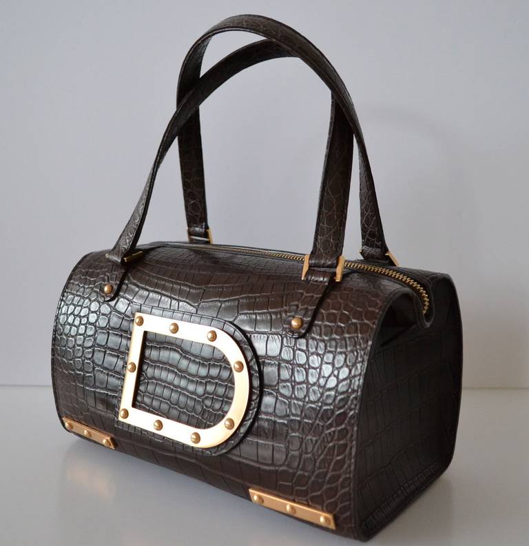 Delvaux Louise Boston handbag

Genuine Alligator brown

Excellent condition – As new

910

Gold Hardware

Delvaux Made In Belgium

It has been used 2-3 times

Dimensions : 9.75 x  6 x  5.75

It will come with dust bag

This Delvaux