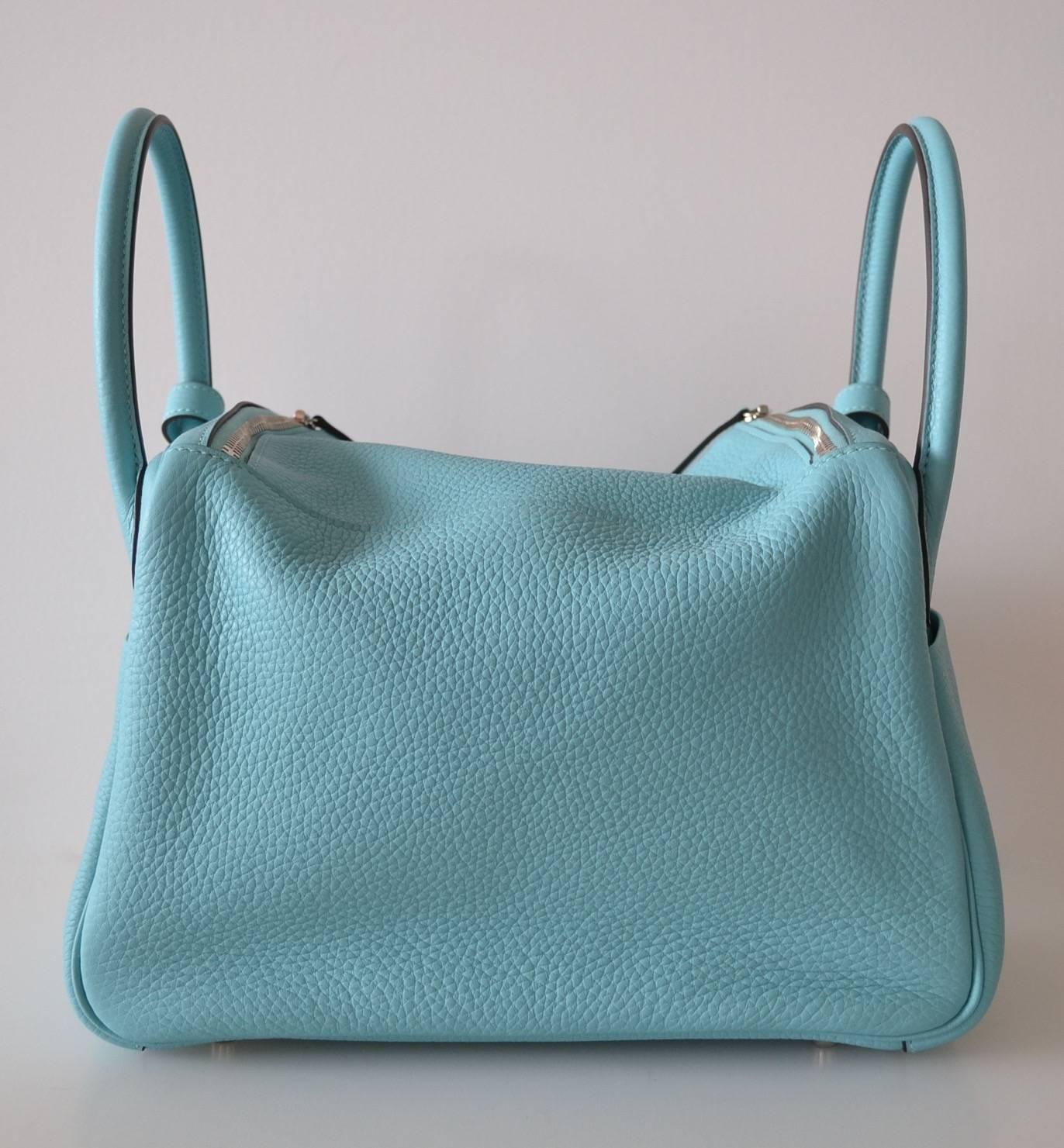 Hermes Lindy 30 Taurillon Clemence Atoll
 
Lindy is in Taurillon Clemence leather in Atoll color
 
Palladium hardware
 
New condition – Never used
This Lindy has a Sales number under “Made In France”. It comes from private access to Hermes