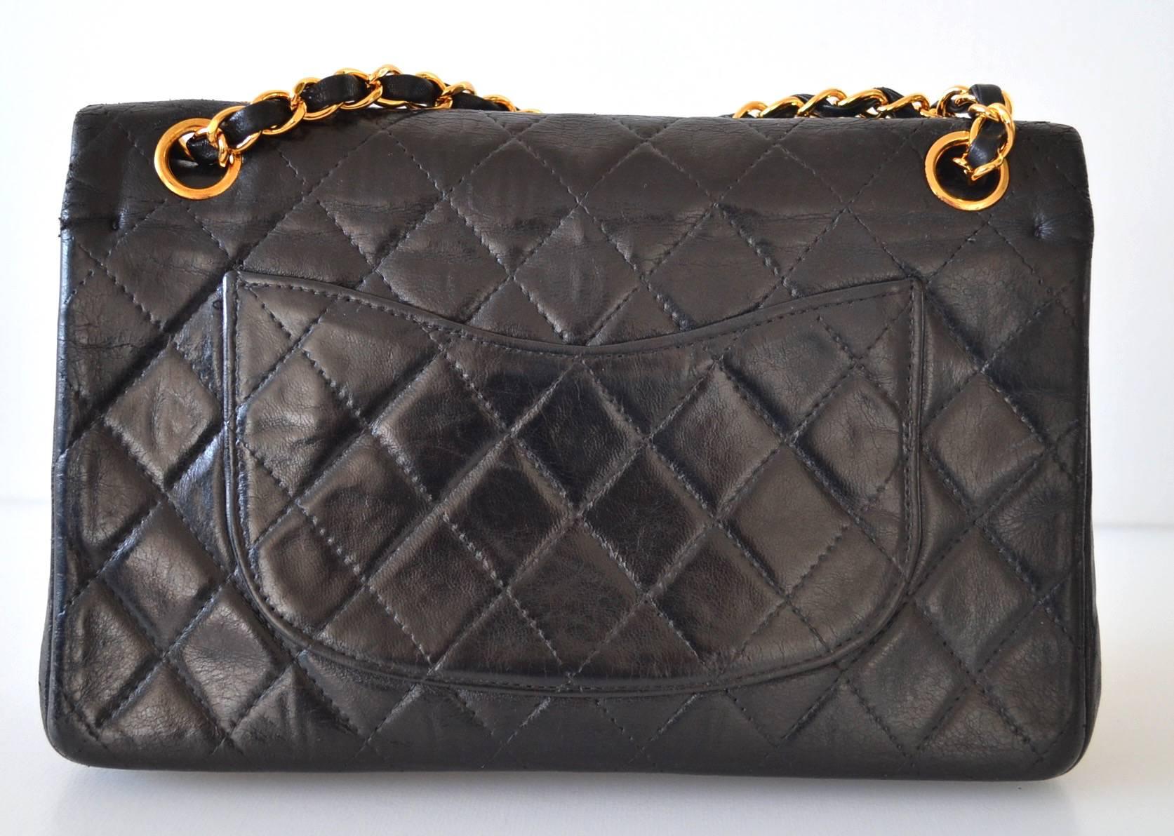 Chanel 2.55 Lamb skin 

Vintage model 

Lamb quilted leather with gold hardware
Clasp 2.55 
Burgundy leather lining with two pockets
This Chanel handbag is in good condition

Chanel Made In France 
1950s

Dimensions : 24 x 16 x 7 cms

