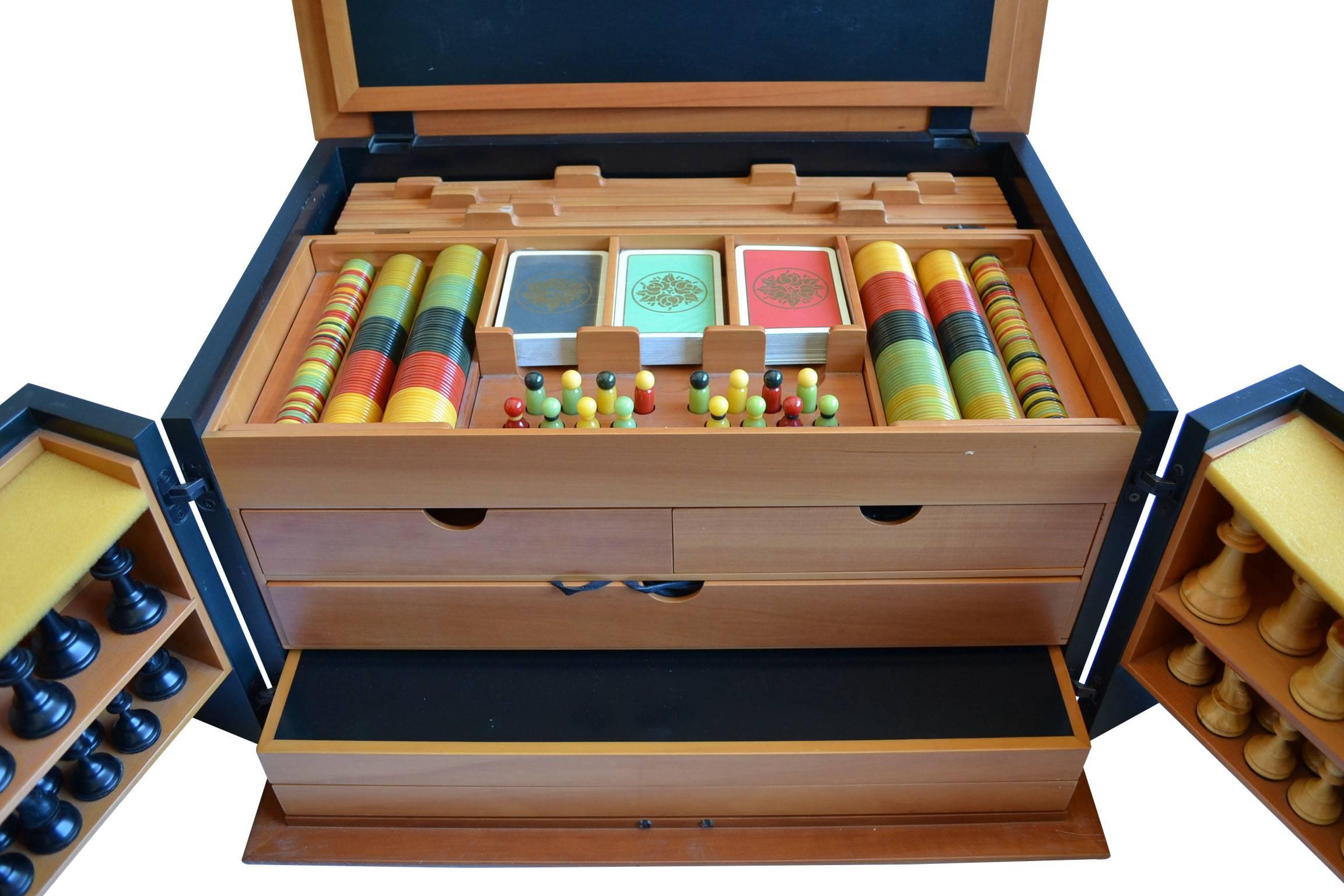 Pierluigi Ghianda for Pomellato – The games box
The games box was made by ebony specialist Pierluigi Ghianda for Pomellato in 1982. A one-of-a-kind, exceptional piece of furniture. Only 300 numbered boxes were produced. Made from precious