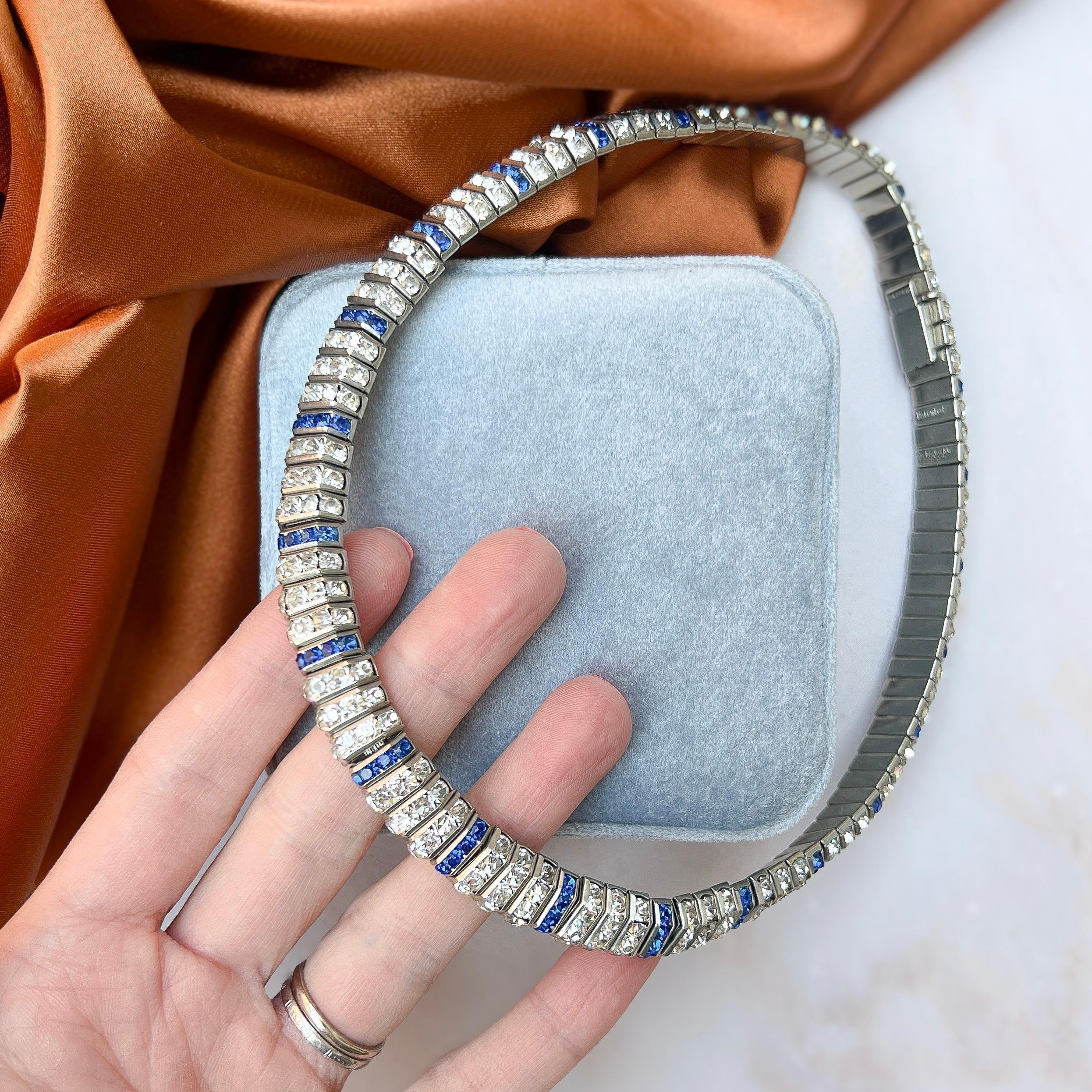 This necklace dates from the 1930s and was made by the German Schrieber and Hiller company.

Condition Report:
Excellent

The Details...
This necklace is constructed from chrome plated metal links, which are threaded onto a flexible band and channel