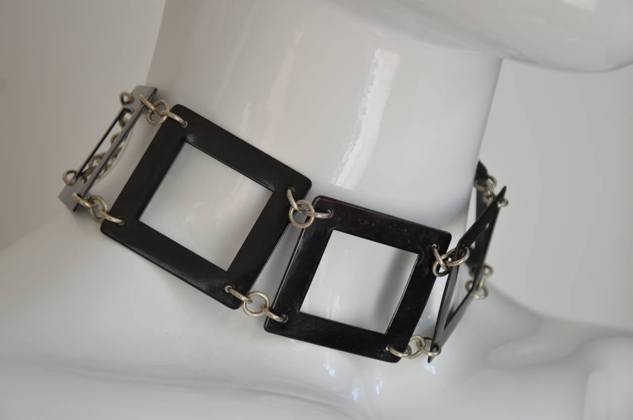 A striking piece of fashion jewelery ; this chocker necklace is Very Paco Rabanne. 
Signed.