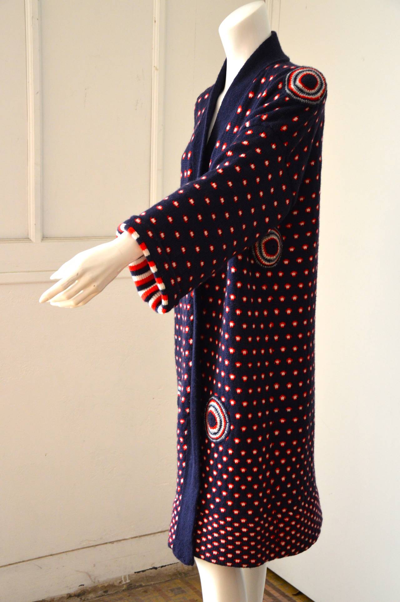 A very rare Mildred Boulton red white and blue knitted maxi coat, 1970s. with matching scarf.
The knitwear was one of Mildred Boulton most successful ventures, creating countless fans of the beautifully subtle palette and extraordinary mixes of
