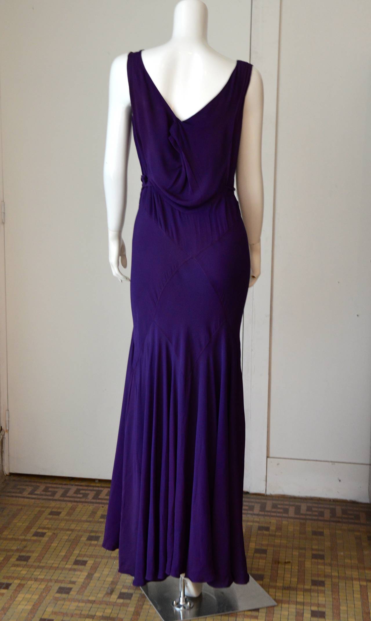 Elegant Purple biais cut 1930 cocktail dress.
very faint small stain to front and back of bodice but barely noticeable, 
small L-shaped darn to rear centre back hem