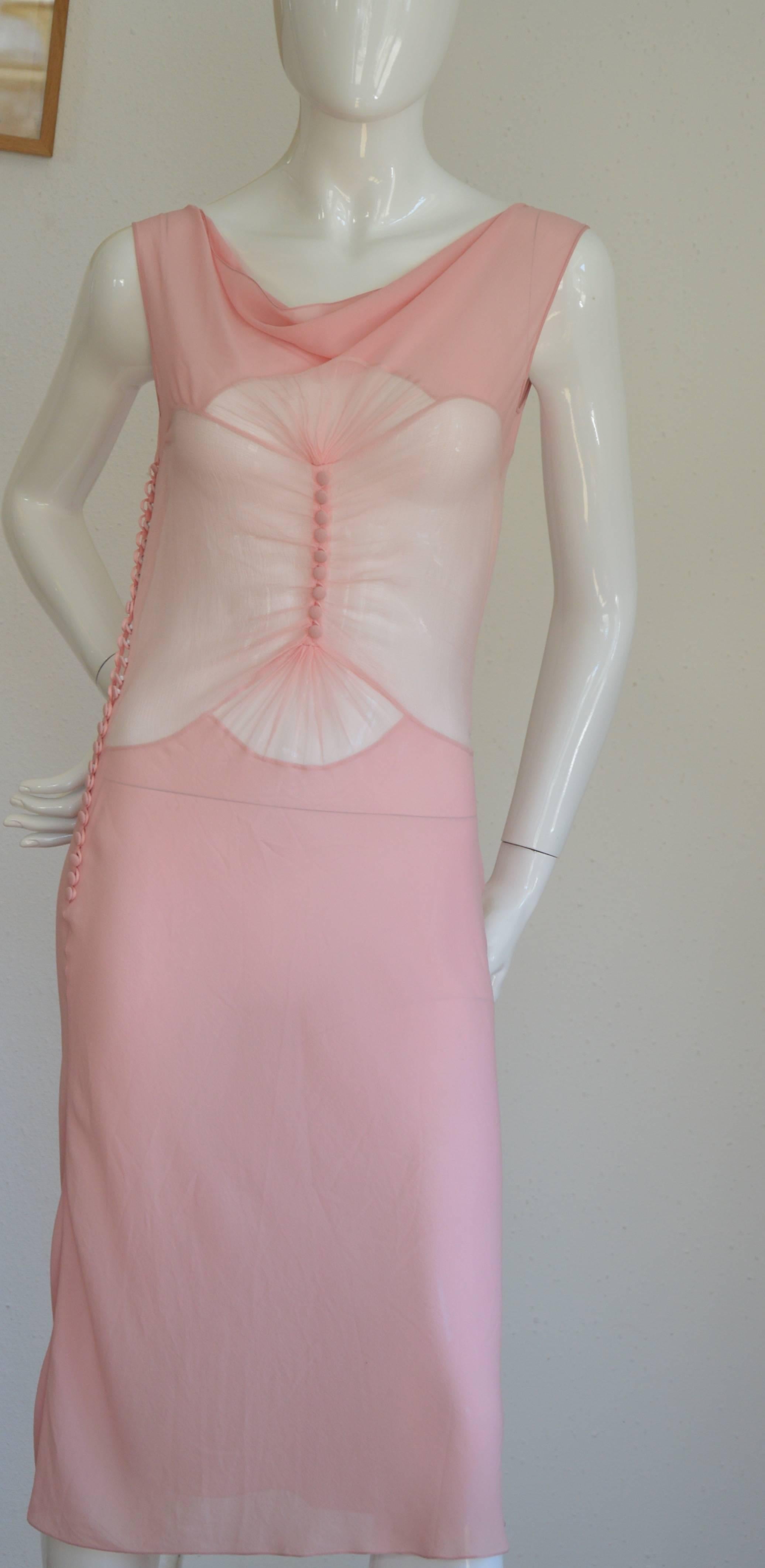 This Guy Laroche "Collection"  flesh color with a pinky touch sheer dress is delicate but with an elaborate sewing construction as a result a flawless sophistication, the dress comes with a tank top to wear as an under dress (numbered on