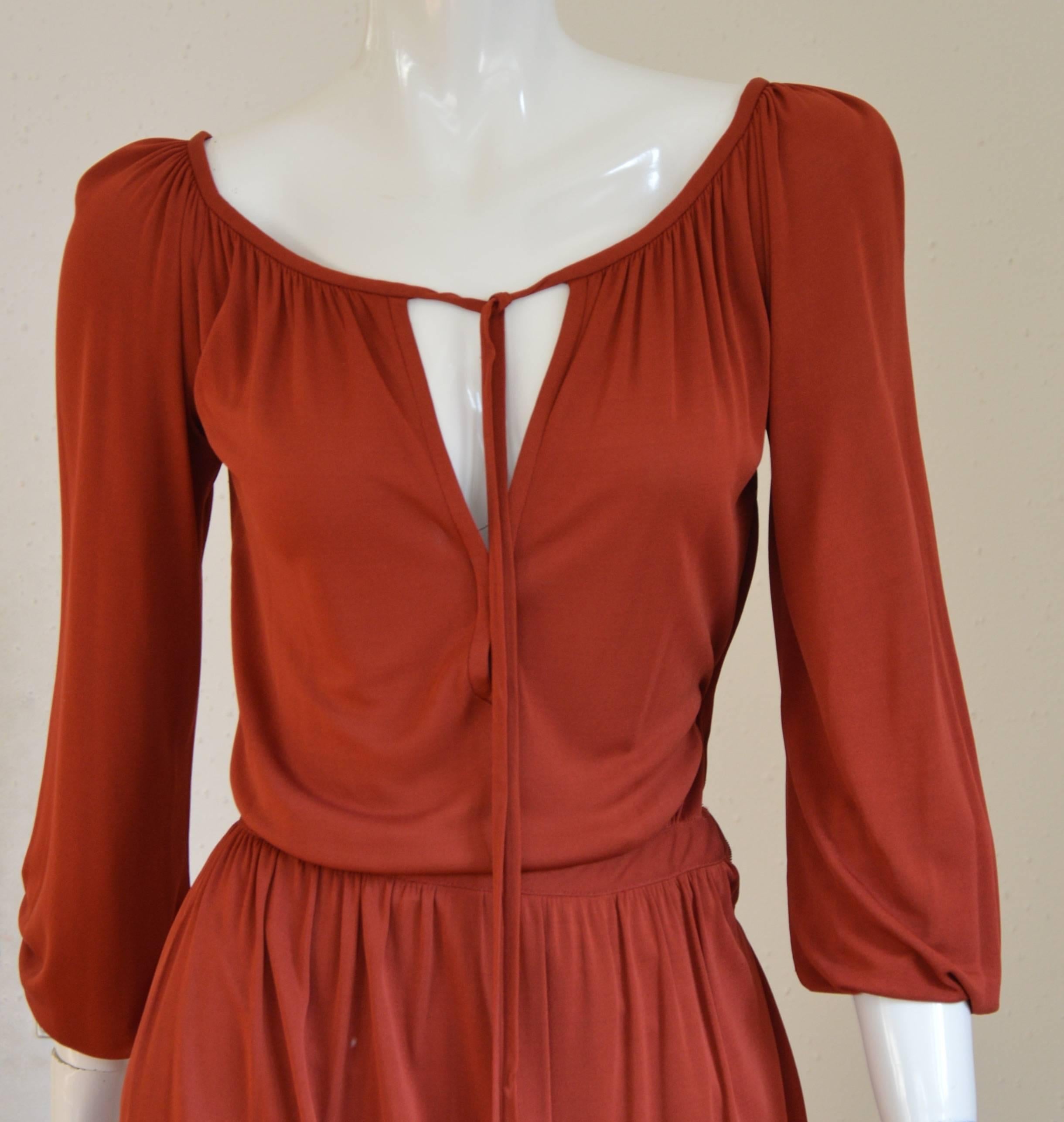 Excellent condition for this superb YSL Rive Gauche lovely dress. The rusty silk jersey is fabulous by itself then the cut is sexy and simple. 2 sides pocket, 1 closure zip on one side.
Measurements :
Bust / 84 cm
Waist / 70 cm
Hips / 92 cm
TL