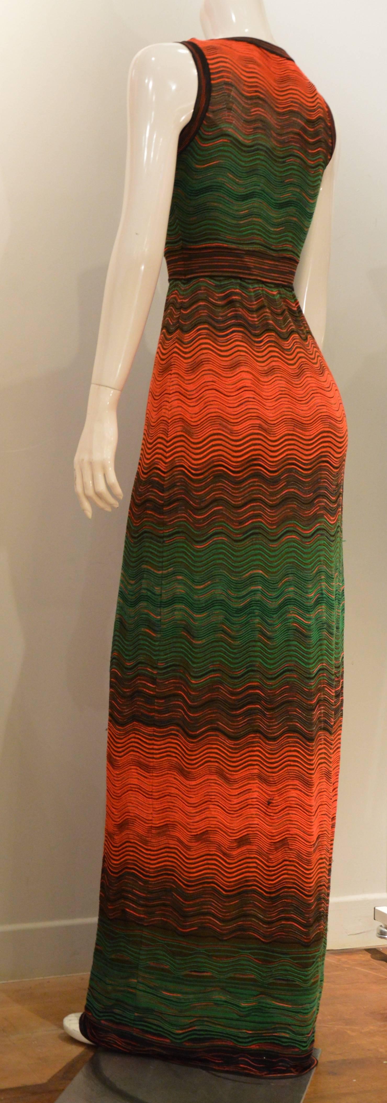 Very elegant and yet an edgy bohemian twist in this luxurious long Missoni dress: the essence of the Missoni House.
Day or night this gown is sophisticated.
Stretchy Fabric , size 38.
Measurements : Bust / 72 cm, Waist / 72 cm , Total Length / 162