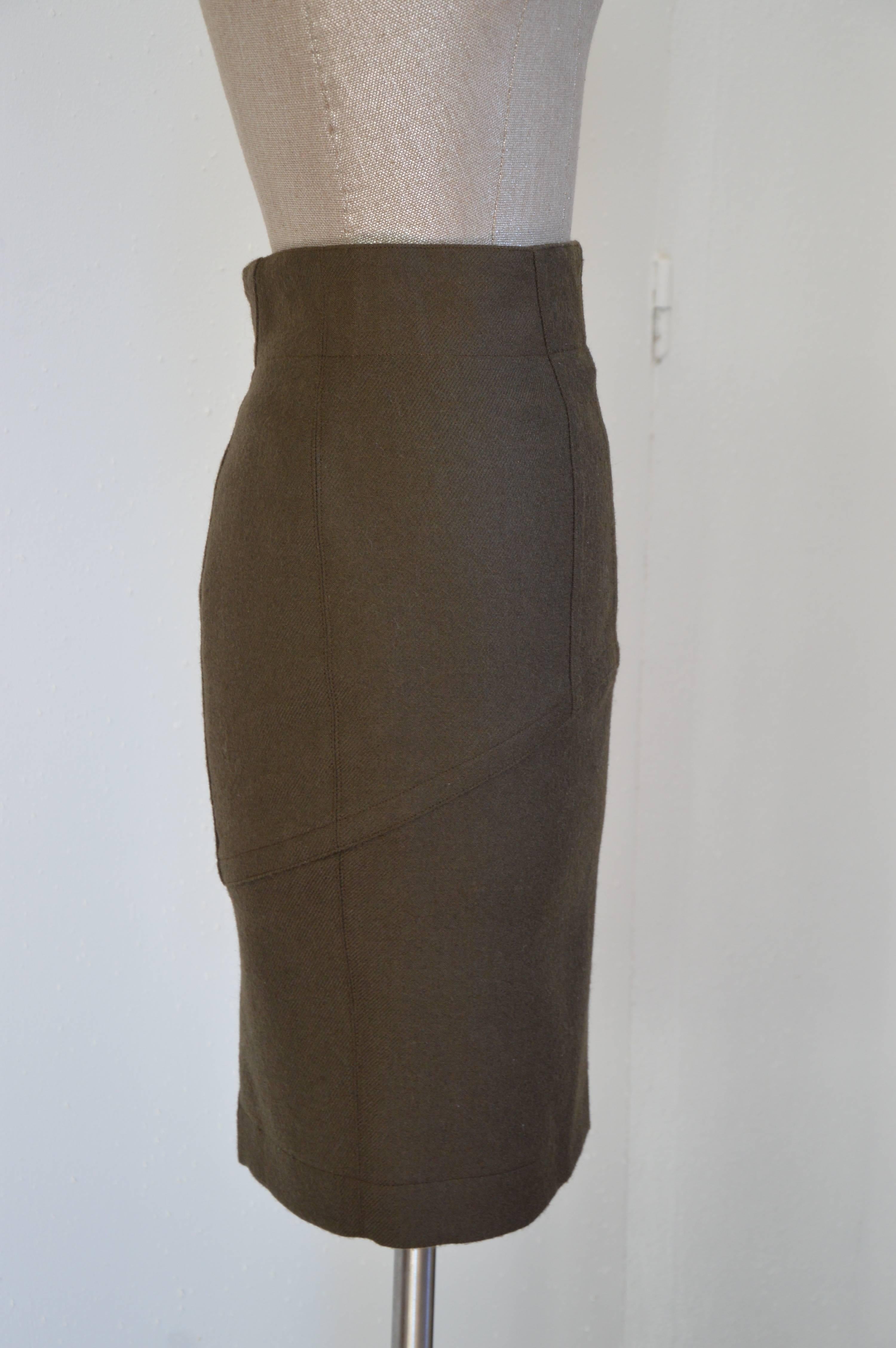Vintage Azzedine Alaia Made in France pencil wool skirt featuring graphic stitching details
Size 36 (EU)
Size 4 (US)