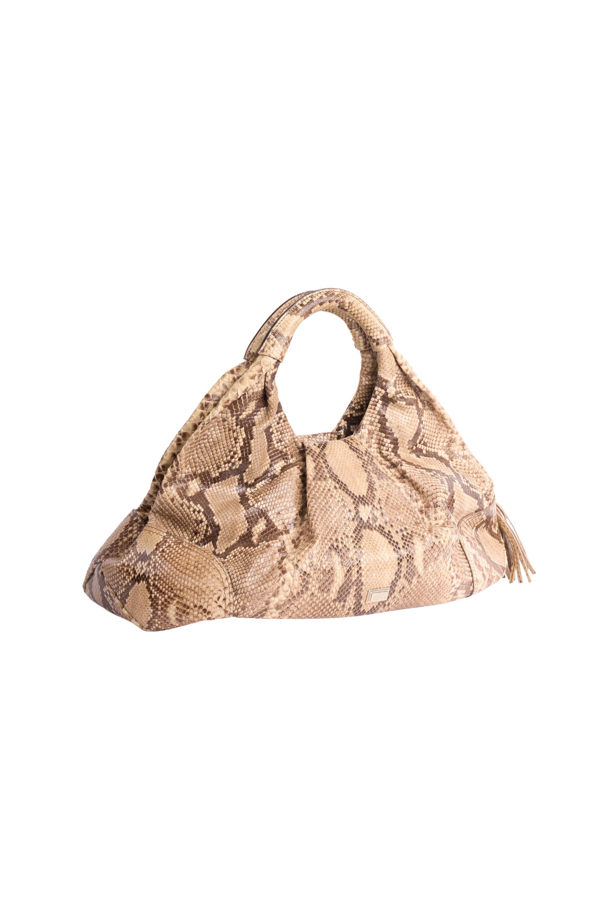 Vintage circa 2000's Gianfranco Ferre beige snake skin large handbag.Feature A beige brown snake skin tones all over, 