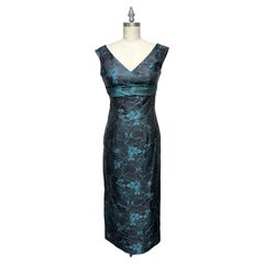 Mitternachtsblaugrünes Blumen-Jacquard-Kleid mit V-Ausschnitt und Schleifendetail