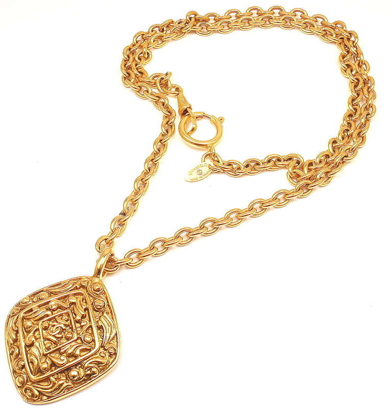 CHANEL Vintage Long Textured Amulet Logo Necklace 1