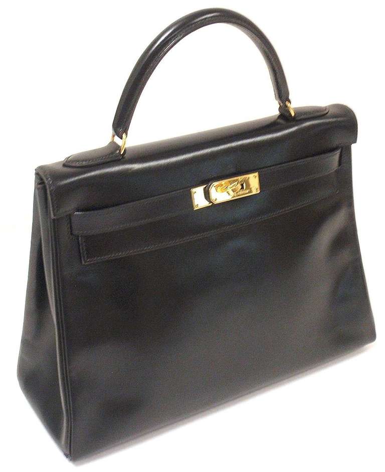 GREAT CONDITION HERMES 32CM BLACK BOX LEATHER SHOULDER KELLY HANDBAG, YEAR 1995

*Please note, color may not be fully representative of handbag based on monitor and lighting. This handbag is black.

Beautiful and classic box leather:  The