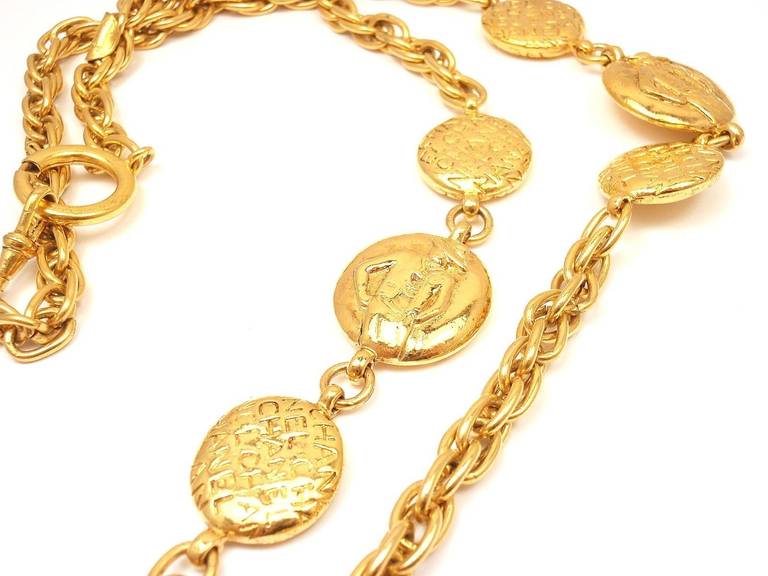 Vintage Gold Tone Long Chunky Flat Bead Logo Coco Figure Belt Necklace from CHANEL. 

Measurements: 5mm chain, 18.5-21.5mm flat beads, 37 inches long.
Weight: 145.1 grams
Stamped Hallmarks:  Chanel Made in France 

*Free Shipping within the