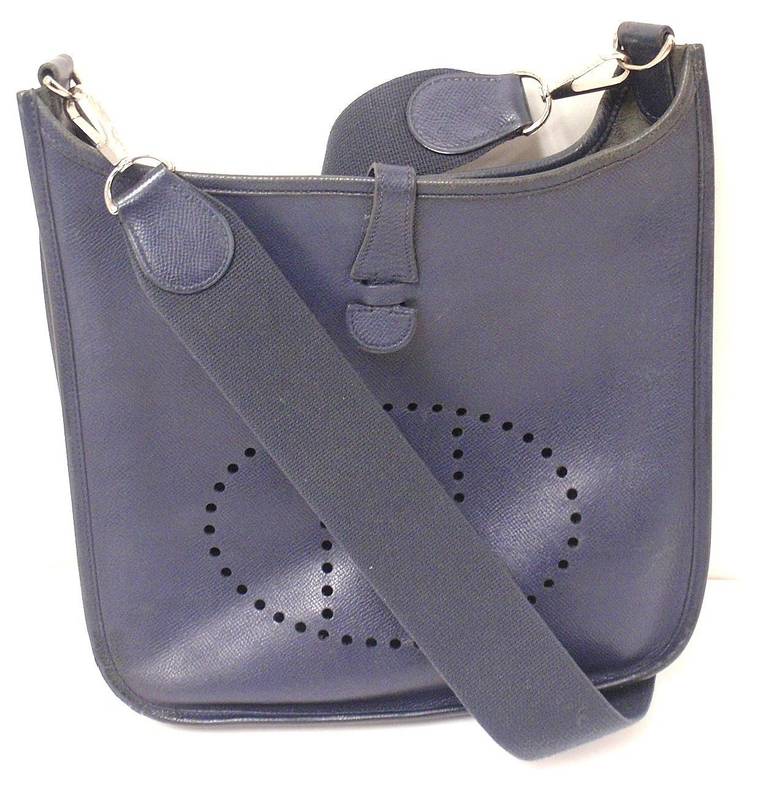 HERMES EVELYNE PM NAVY EPSOM LEATHER SHW SHOULDER BAG, 2006, OK

 This bag is in OK condition. Features the navy epsom leather.

Please note, color can vary greatly from monitor to monitor. 

Exterior:
Scratches/Stains: There are one or two