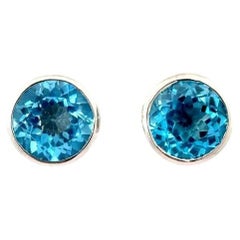 Sleek Bezel Round-Cut Deep Blue Topaz Solitaire Stud Earrings in 925 Silver