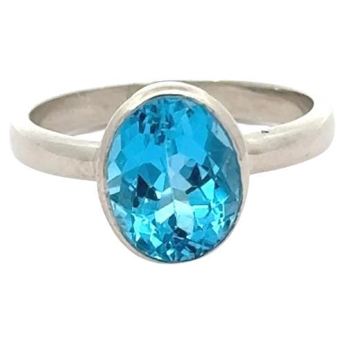in vendita:  Anello a fascia solitario modernista con topazio blu cielo in argento 925 Regalo di gioielli unisex