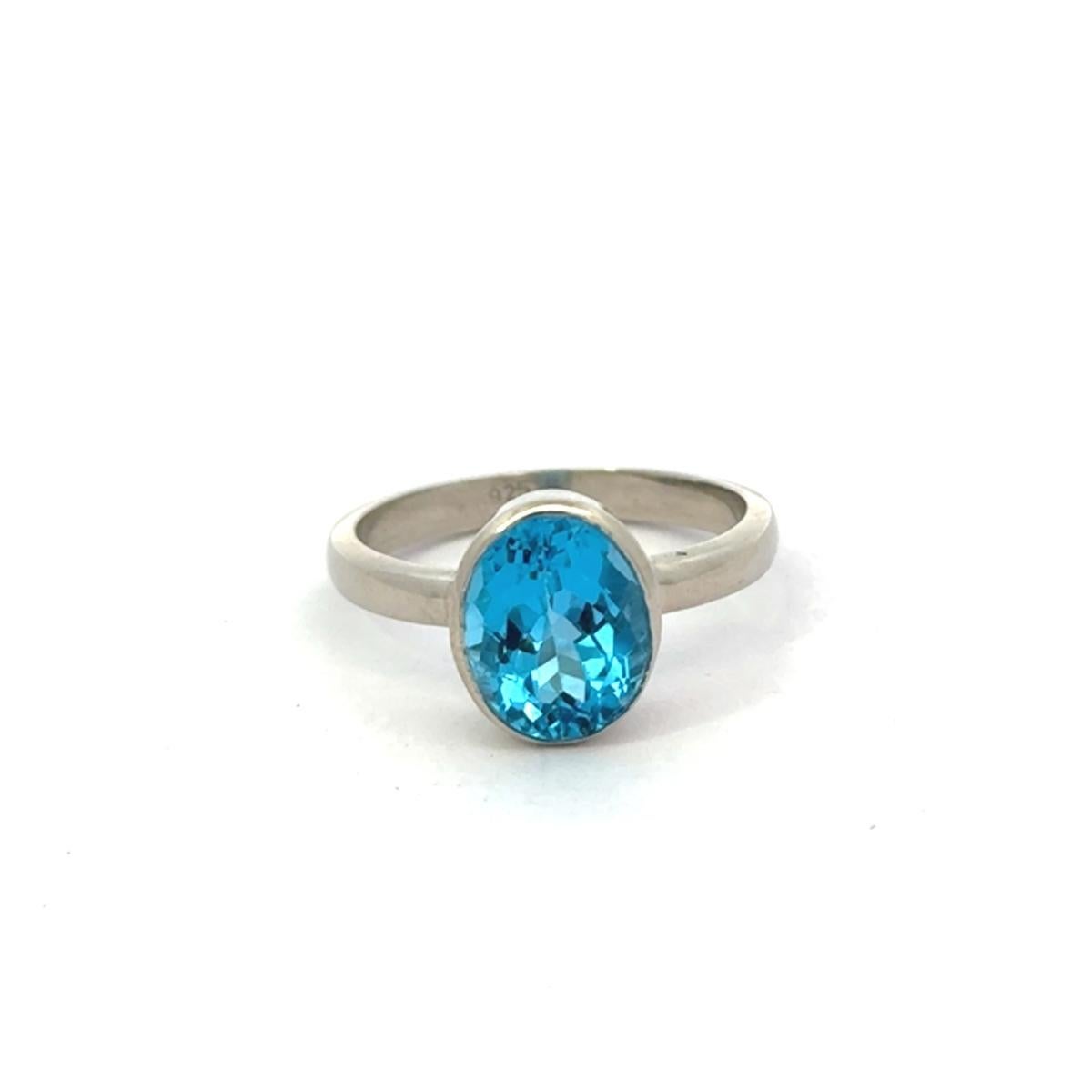 in vendita:  Anello a fascia solitario modernista con topazio blu cielo in argento 925 Regalo di gioielli unisex 6