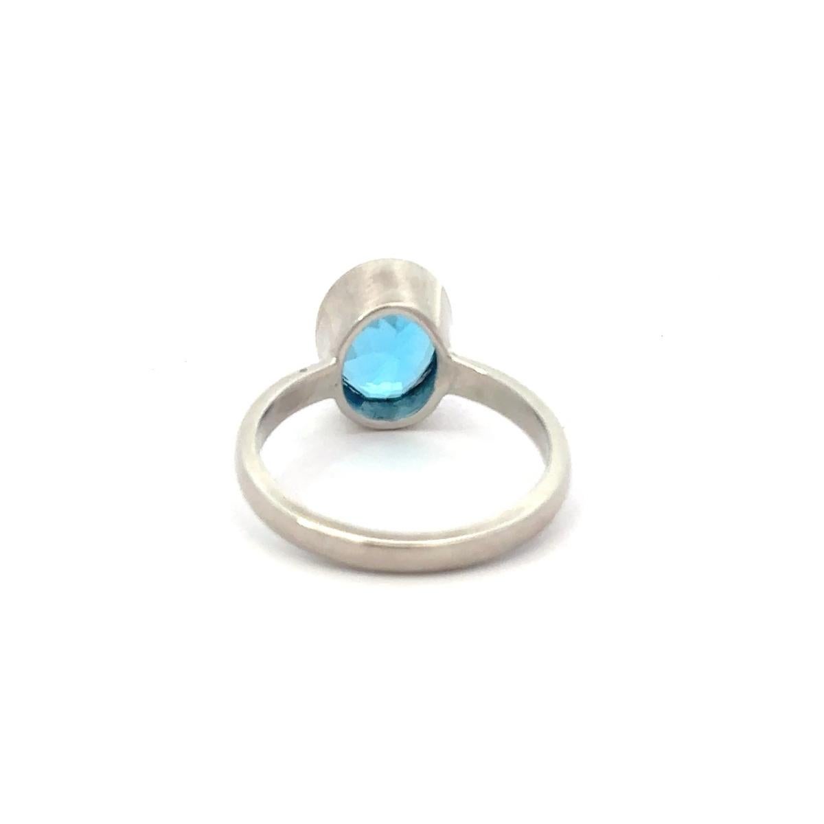 in vendita:  Anello a fascia solitario modernista con topazio blu cielo in argento 925 Regalo di gioielli unisex 4