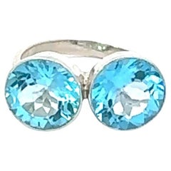 Bague contemporaine Toi et Moi Topaze Bleue Bypass en Argent 925
