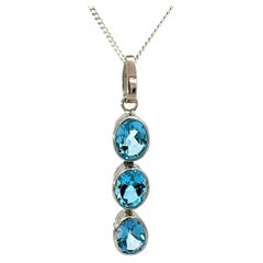 Bezel Set 7.49 CTW Blue Topaz Triple Linear Silver Pendant Luxury Jewelry Gift