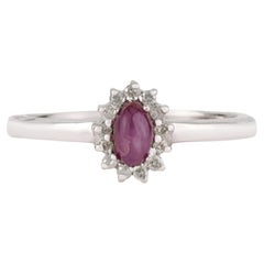 Silvorra Oval Cabochon Star Ruby and Diamond Floral Halo Ring in Sterling Silver
