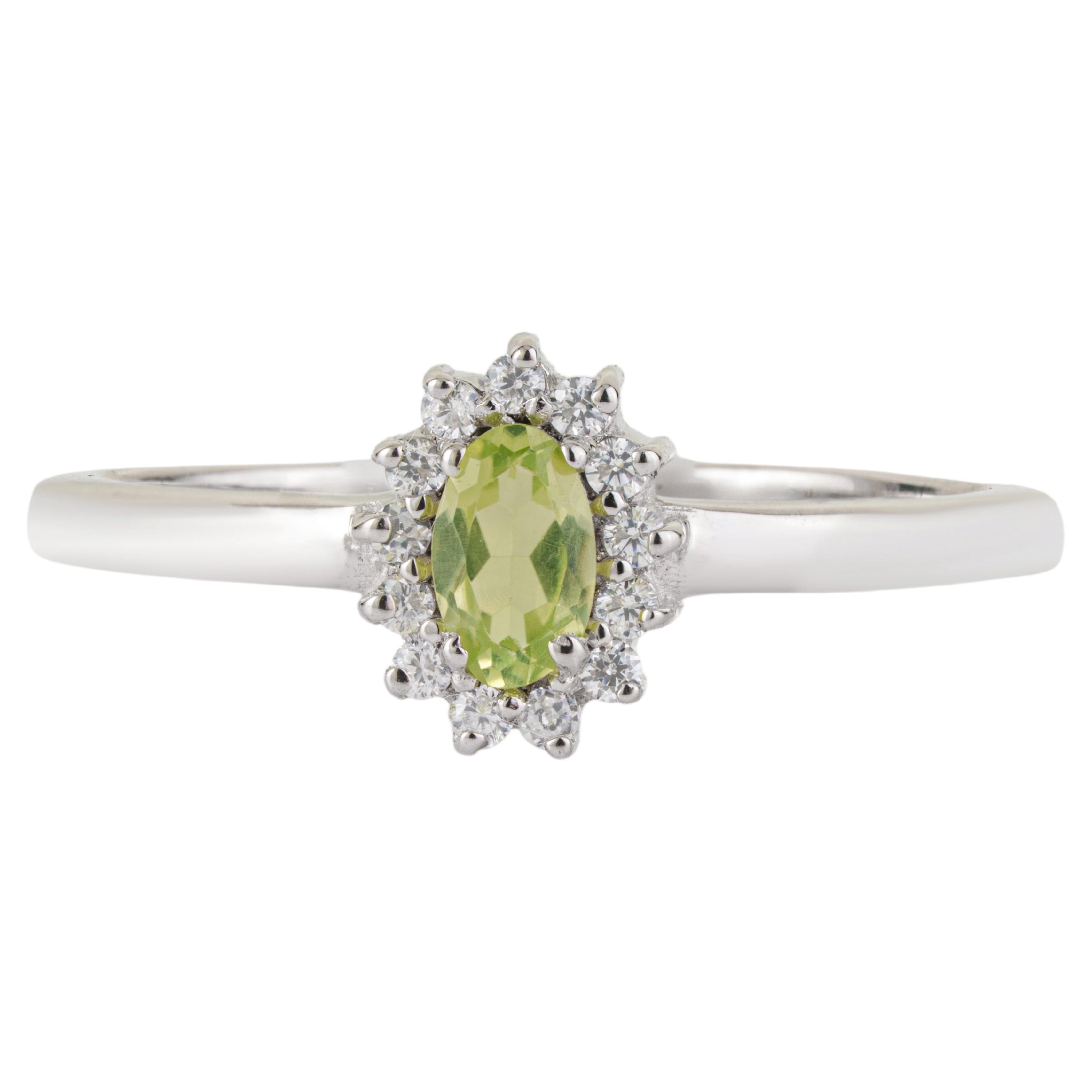 For Sale:  Silvorra Oval Cut Peridot & Zircon Halo Cluster Handmade Ring in Sterling Silver