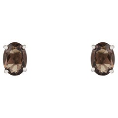 Silvorra Oval Cut Smoky Topaz Solitaire Stud Earrings in 925 Sterling Silver