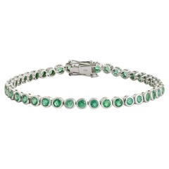 Pulsera tipo «tenis» de Silvorra con bisel de esmeraldas de corte redondo clásico de 5,8 ct, en plata maciza