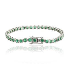 Pulsera tipo «tenis» de Silvorra con bisel de esmeraldas de corte redondo clásico de 5,8 ct, en plata maciza