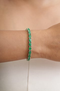 Pulsera tipo «tennis» de plata 925 con una esmeralda ovalada de 8,8 ct y un zafiro azul redondo de 2,4 ct