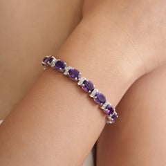 Bracelet « tennis » Silvorra de luxe en argent massif, orné d'améthystes et de topazes blanches