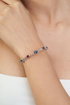 Bracciale Silvorra in argento sterling 925 con topazio blu di Londra e granato, 7,5"