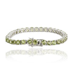 Bracciale tennis Silvorra Classic con peridoto da 22 carati in argento sterling 925 per lei