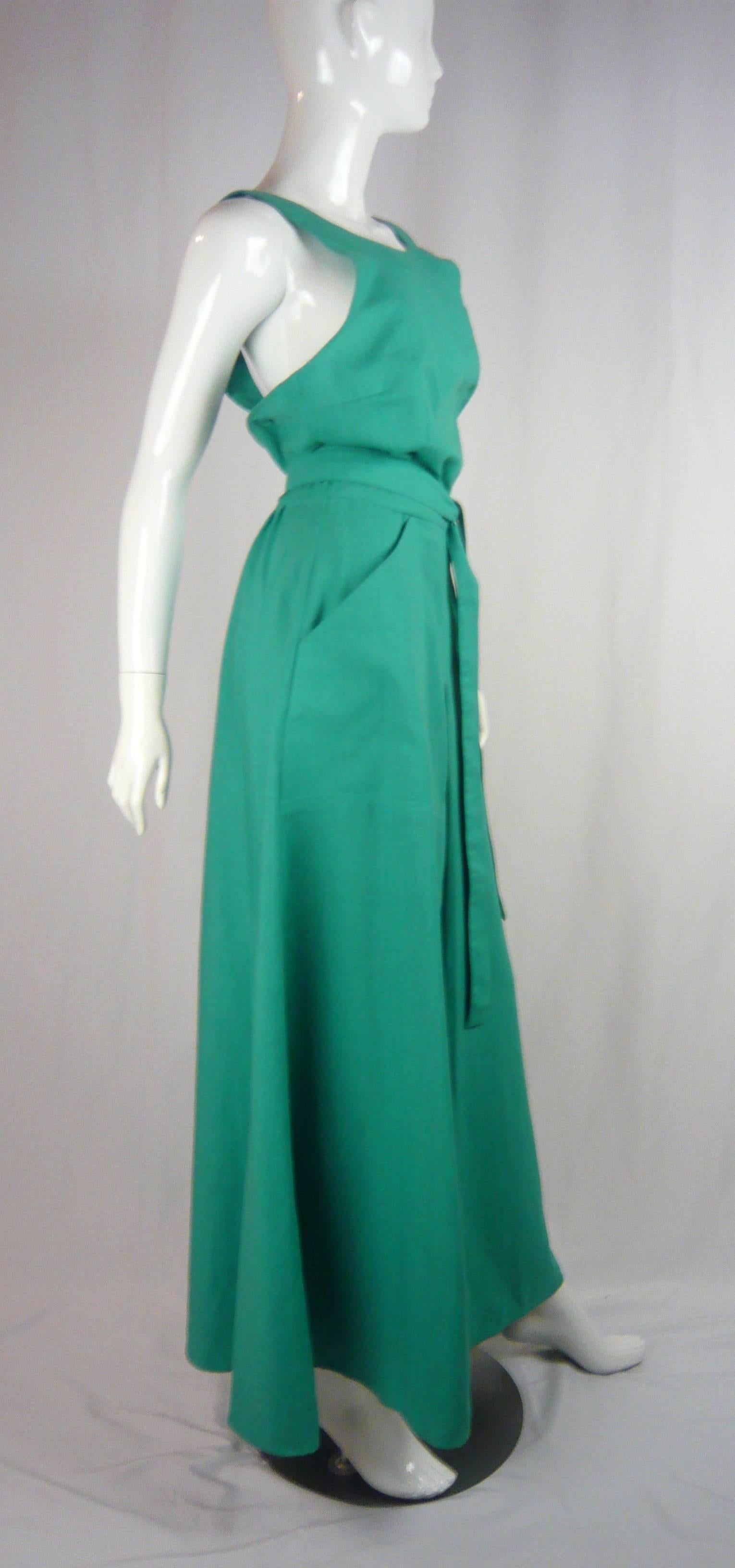 Nina Ricci Mint Green Linen Day Dress circa 1988,  

Designed by Jules-François Crahay for Nina Ricci this gorgeous gown is the true essence of femininity, Simplistic in design the dress displays two large pockets in the front and a minimal