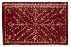 Stanway. Red leather purse hand tooled with gold in eighteenth century style