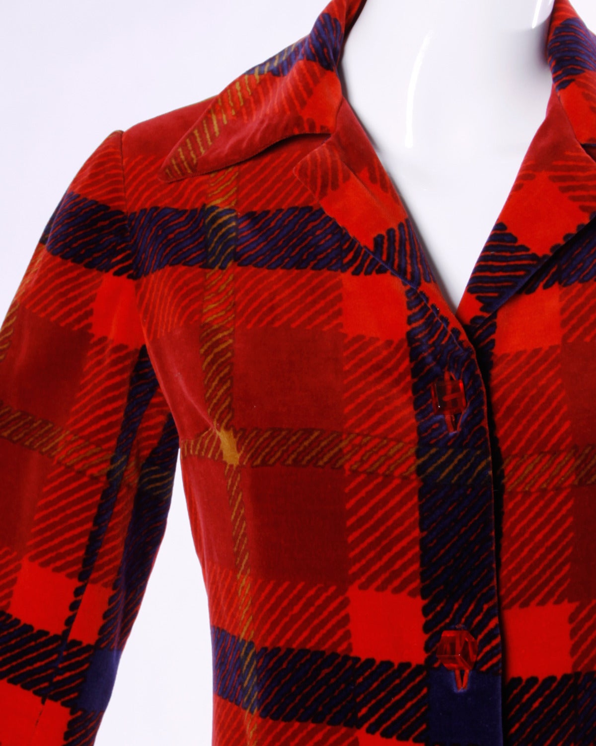 Darling vintage plaid velvet coat by Bill Blass for Saks 5th Avenue. Amazing red lucite cube buttons!

Details:

Fully Lined
Side Pockets
Front Button Closure
Estimated Size: Small- Medium
Color: Red/ Blue/ Purple
Fabric: Velvet
Label: