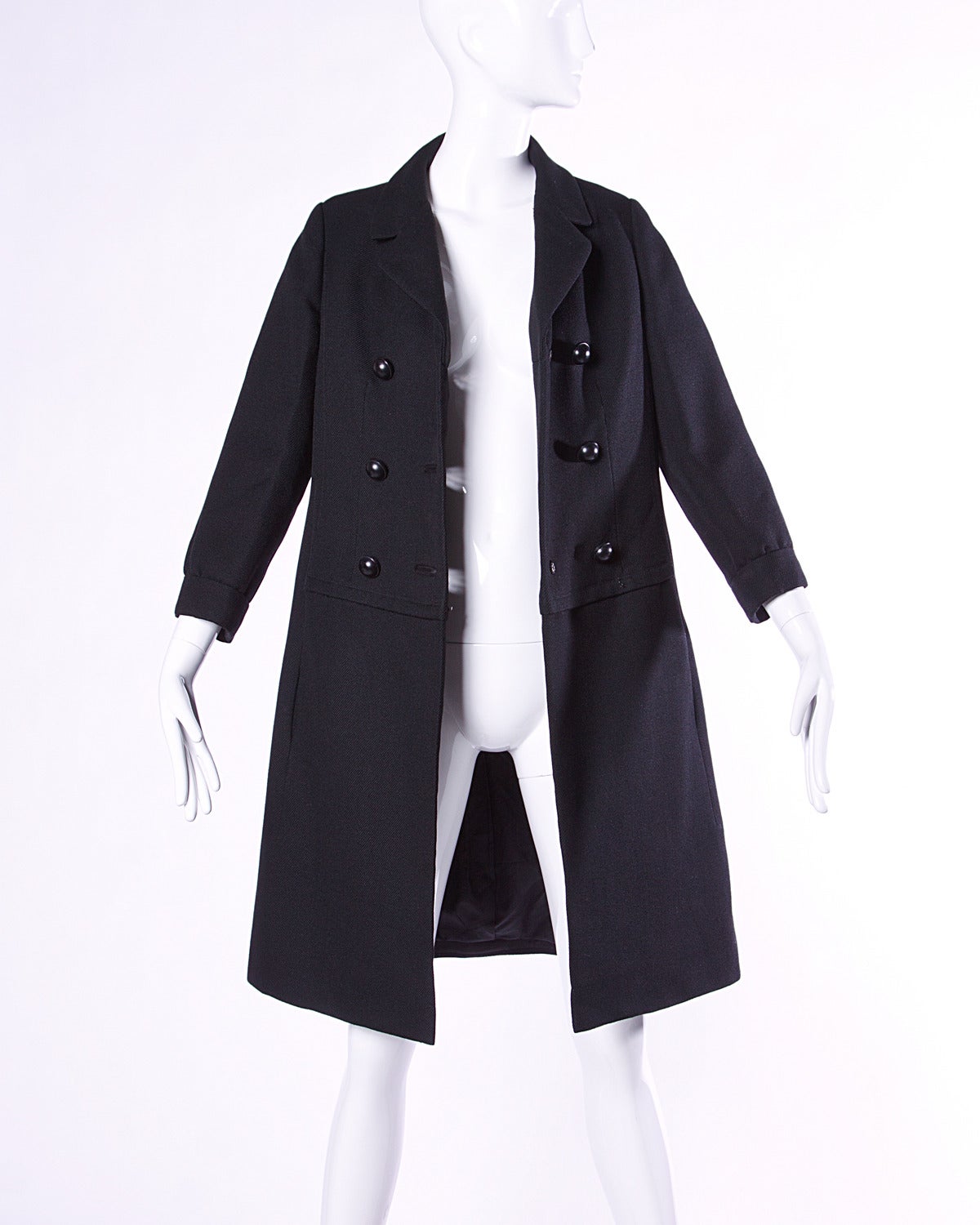 Gorgeous vintage black wool pea coat by Christian Dior in pristine condition. Double breasted buttons and notched lapels.

Details:

Fully Lined
Side Pockets
Front Button and Hook Closure
Marked Size: 8
Estimated Size: Medium
Color: