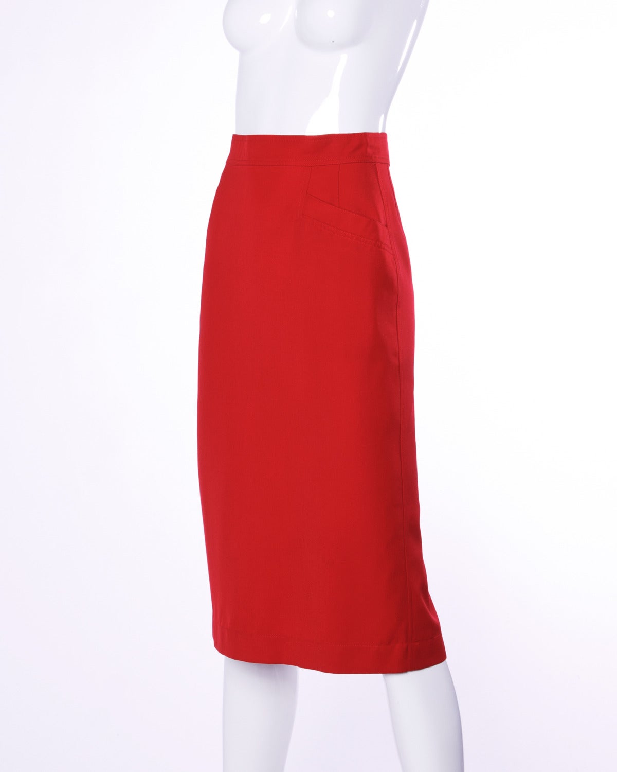 Vintage Krizia red wool pencil skirt. Simple and chic!

Details:

Fully Lined
Front Pockets
Back Zip and Button Closure
Marked Size: 40
Color: Candy Apple Red
Fabric: Wool
Label: Krizia

Measurements:

Waist: 26"
Hips: